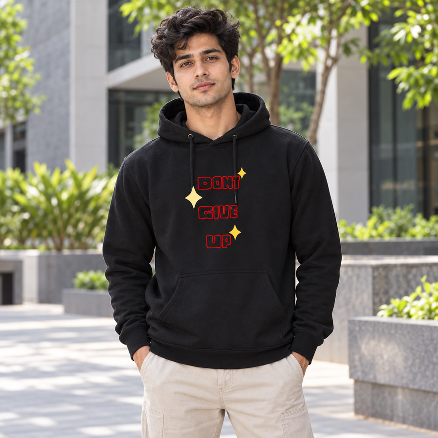 Indian male model wearing the black All-Day Comfort Hoodie, front graphic visible