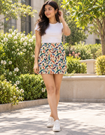 Lifestyle photo showing AOP Mini Skirt 8 worn by a model