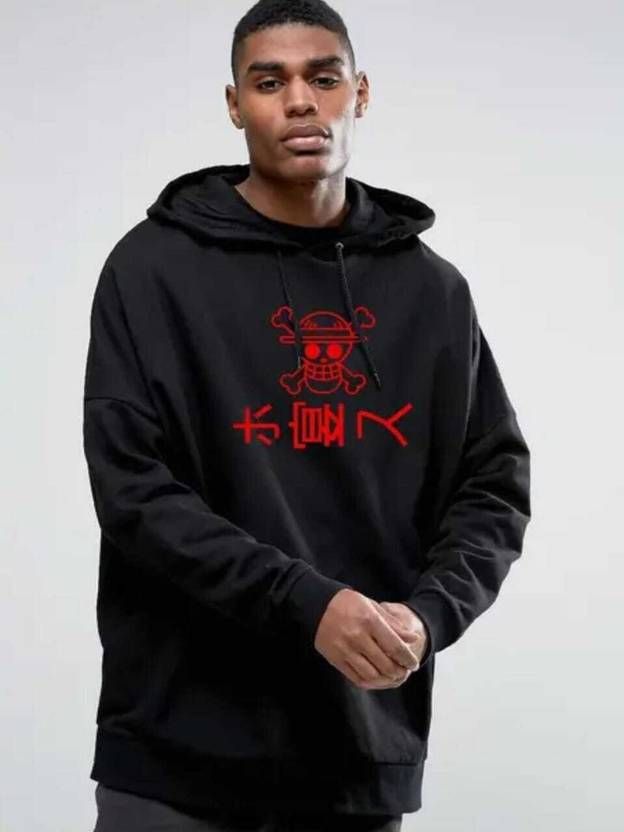 Person wearing a black hoodie with red graphics and text on a white background
