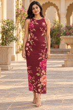 Full-length lifestyle view of an Indian model wearing the Garnet Bloom Burgundy Floral Bodycon Maxi Dress