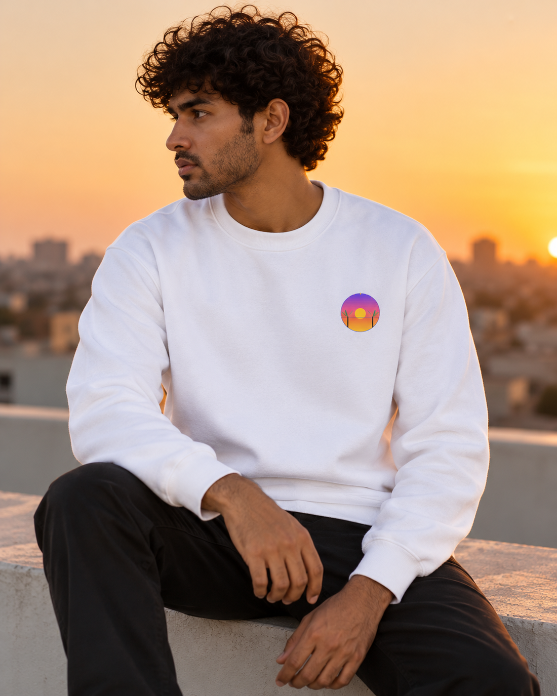 Golden Hour Fleece Sweatshirt — seated front lifestyle
