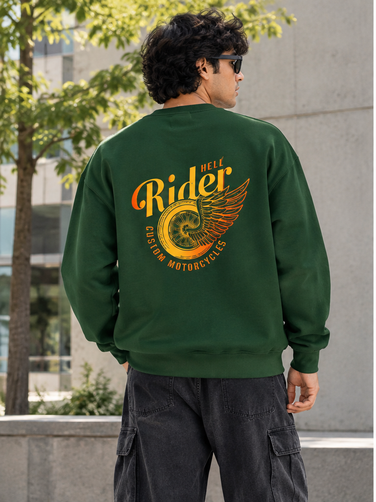 Hell Rider green oversized sweatshirt lifestyle photo showing the exact orange and yellow back motorcycle graphic