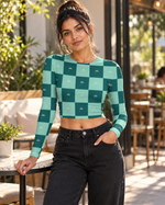 Teal checker AOP full sleeve crop top worn in a café lifestyle setting