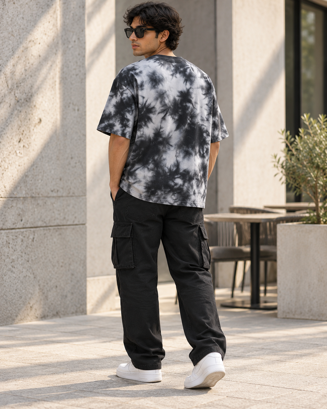 Oversized Tie Dye Unisex T-Shirt | Streetwear Fit — angle lifestyle photo
