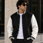 Unisex varsity jacket black and white lifestyle front view